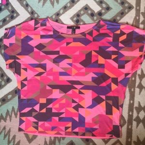 XXI Geometric Top